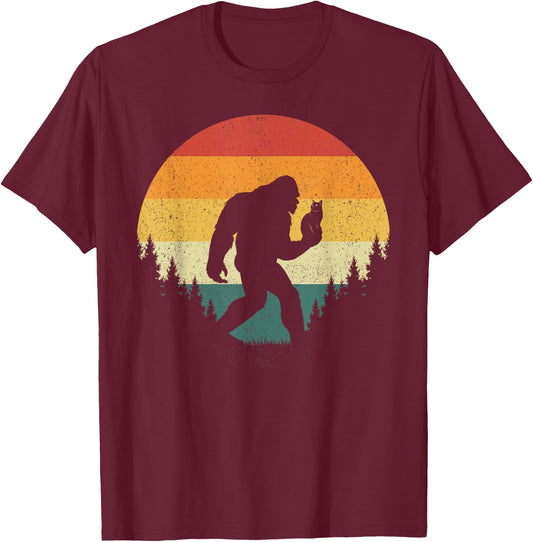Bigfoot Holding Cat Funny Sasquatch Retro Vintage Sunset 80s Men Women Kids T-Shirt - T-Shirt | Maroon