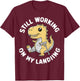 Still Working On My Landing Dinosaur Broken Bone T-Shirt - T-Shirt | Maroon