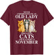 Never underestimate an old lady who loves cats born NOVEMBER T-Shirt - T-Shirt | Maroon
