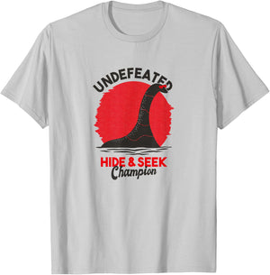 Undefeated Hide and Seek Champion Lochness Monster Nessie T-Shirt - T-Shirt | Ash