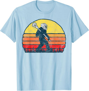 Funny Sasquatch Lax Bigfoot Lacrosse Vintage 80s Sunset T-Shirt - T-Shirt | Light Blue